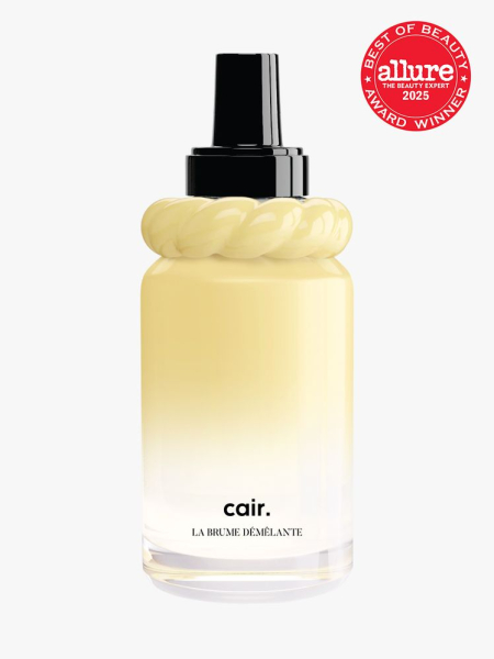 Cair Detangling Spray in decorated yellow gradient bottle with black cap on light gray background with red Allure Best of Beauty seal in the top right corner