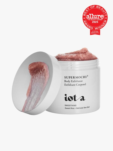 Iota Supermochi Body Exfoliator+ in branded white jar with twist cap on light gray background with red Allure Best of Beauty seal in the top right corner
