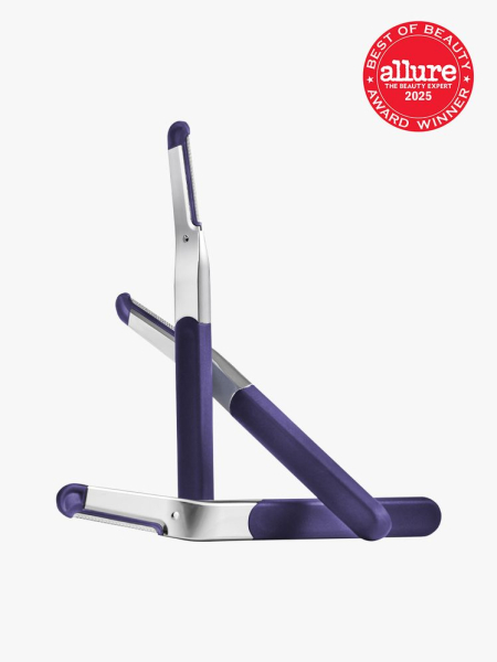 Flamingo Dermaplane Razor in branded purple and metallic silver color way on light gray background with red Allure Best of Beauty seal in the top right corner