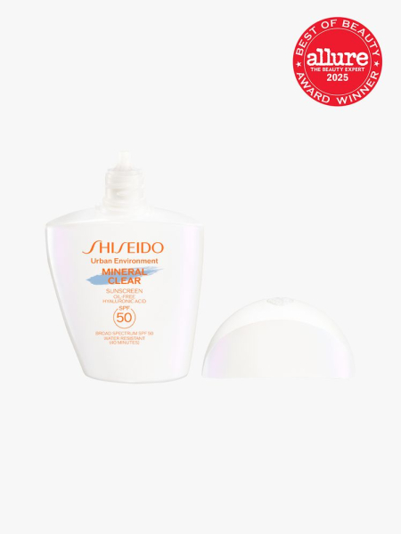 Shiseido Urban Environment Mineral Clear Sunscreen SPF 50 in branded white bottle with cap on light gray background with red Allure Best of Beauty seal in the top right corner