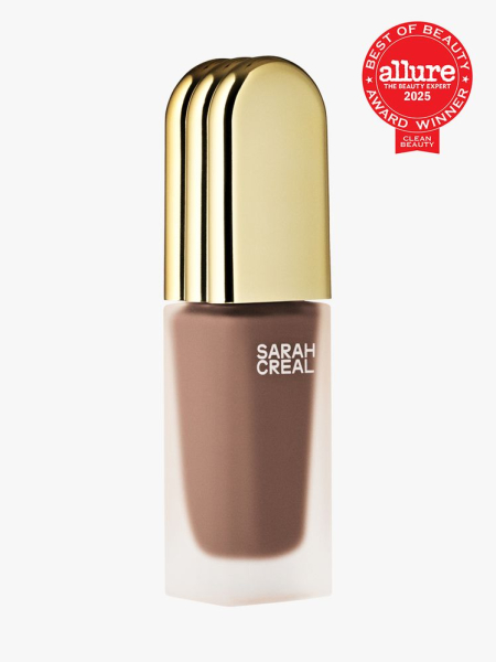 Sarah Creal Beauty Face Flex Concealer and Complexion Enhancer in branded clear tube with golden cap on light gray background with red Allure Best of Beauty seal in the top right corner